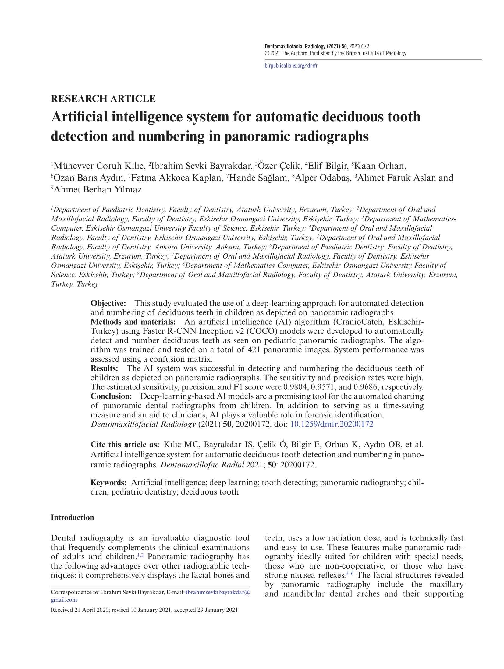 Artificial intelligence system for automatic deciduous tooth detection and numbering in panoramic radiographs