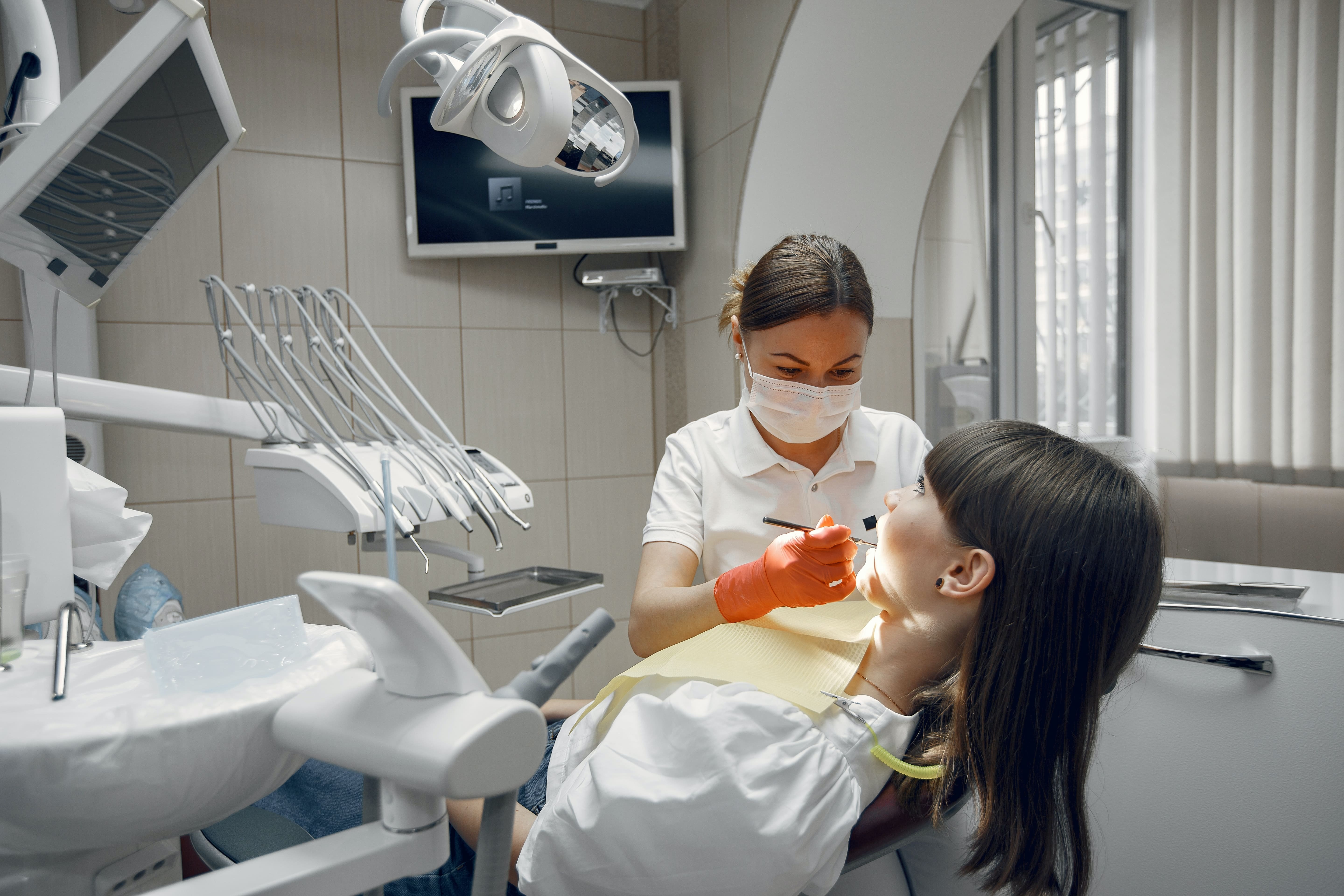 tooth doctor treats his patient