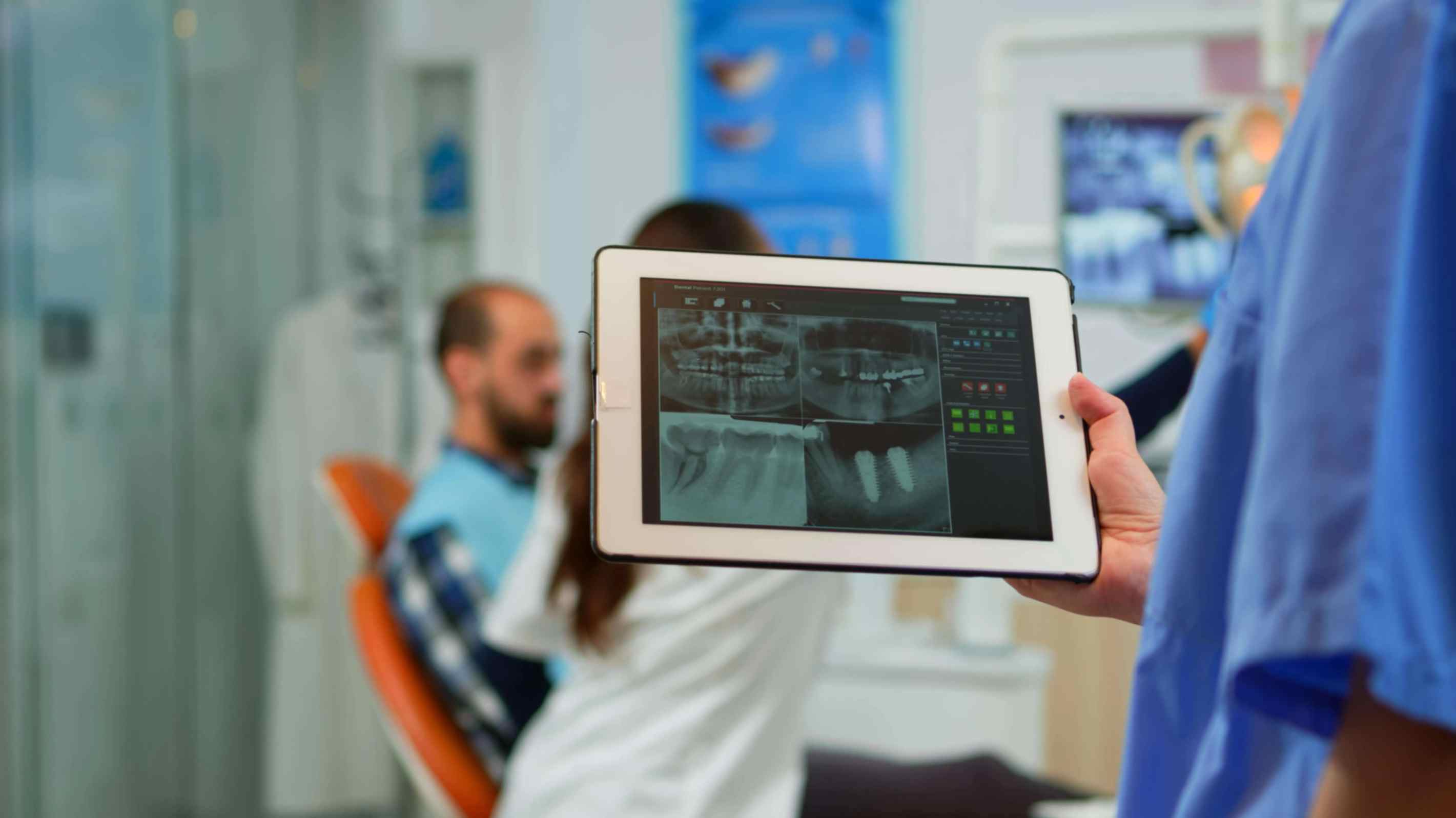 doctor conducts diagnostics using dentistry technology