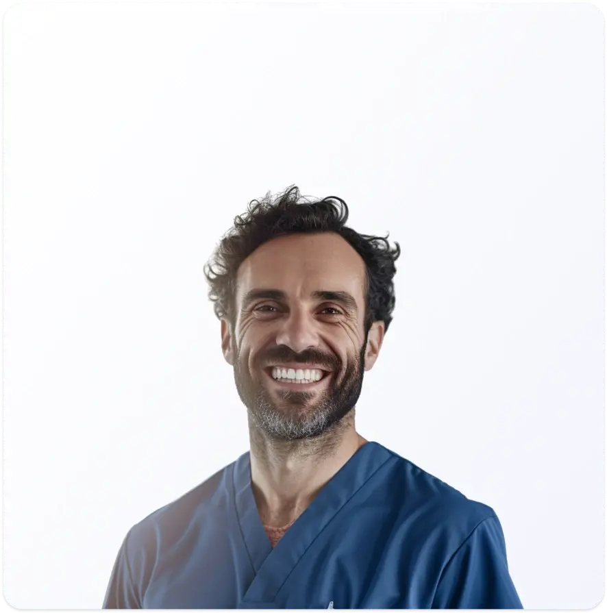 Smiling dentist in blue scrubs